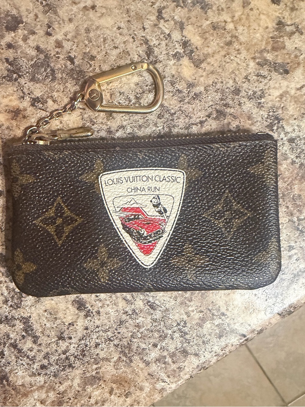 Louis Vuitton Brown Monogram Key Pouch with Crest Patch